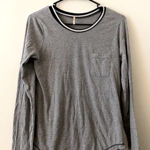 Long sleeved shirt got from zumiez. No rips or tears. You cannot see through.